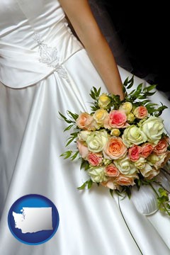 a bride, wearing a white wedding dress and holding a beautiful bridal bouquet - with Washington icon